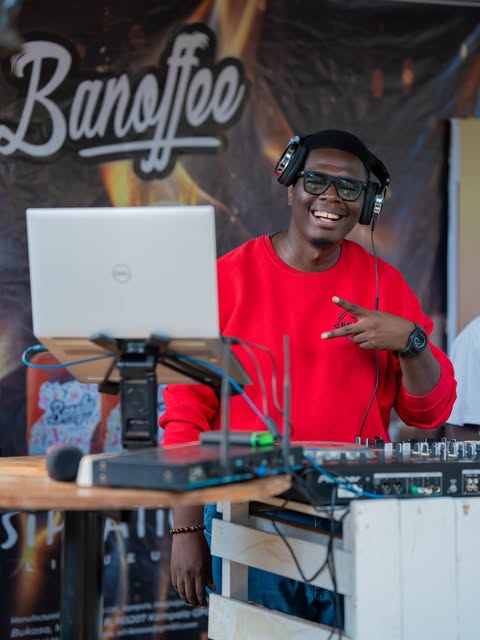 DJ performing in front of a Banoffee banner